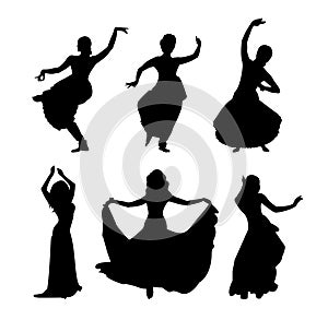 Silhouettes of dancing girls Indian dances and oriental belly dancing